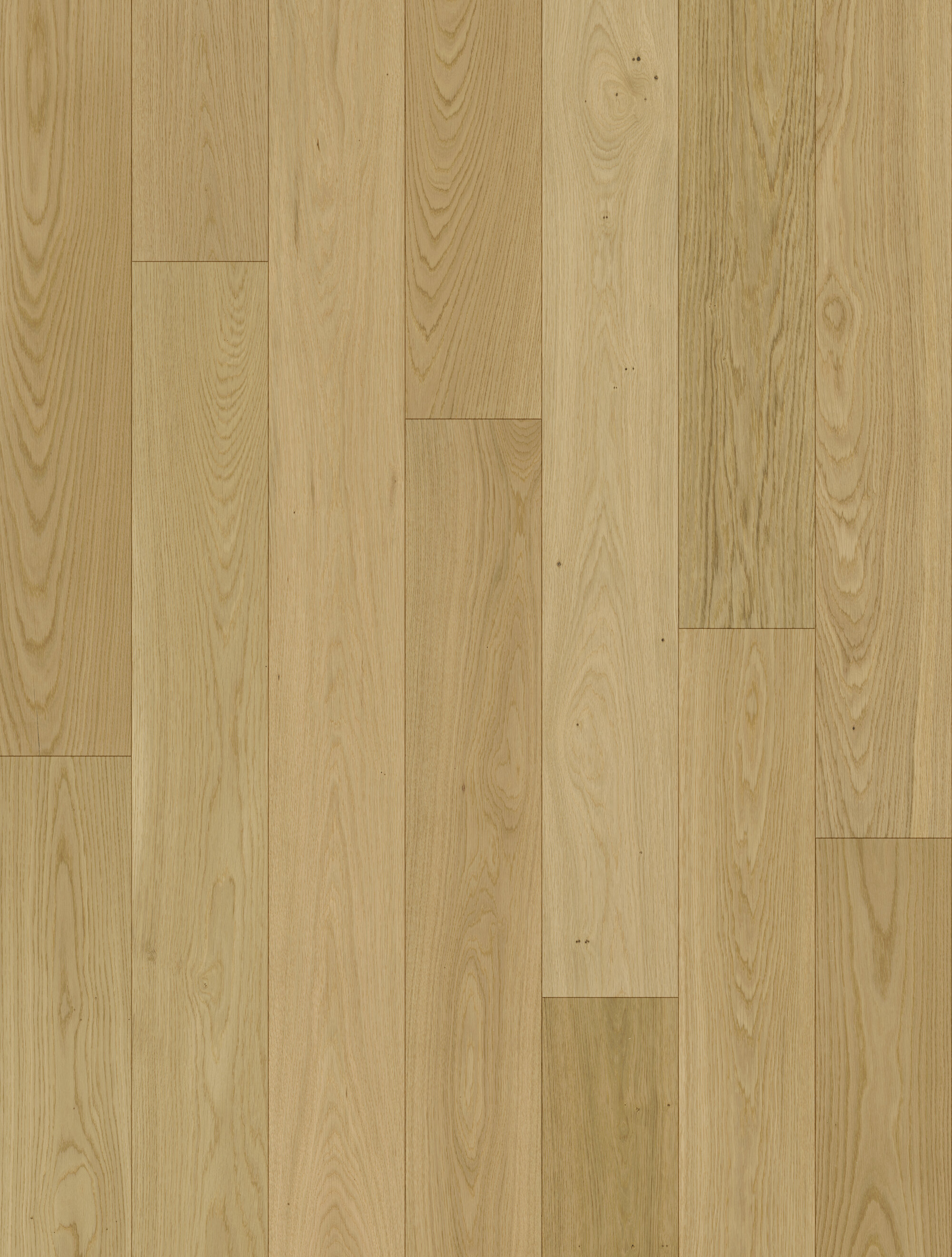 Detailansicht eines hellen Eichenparkettbodens mit natürlicher Holzmaserung